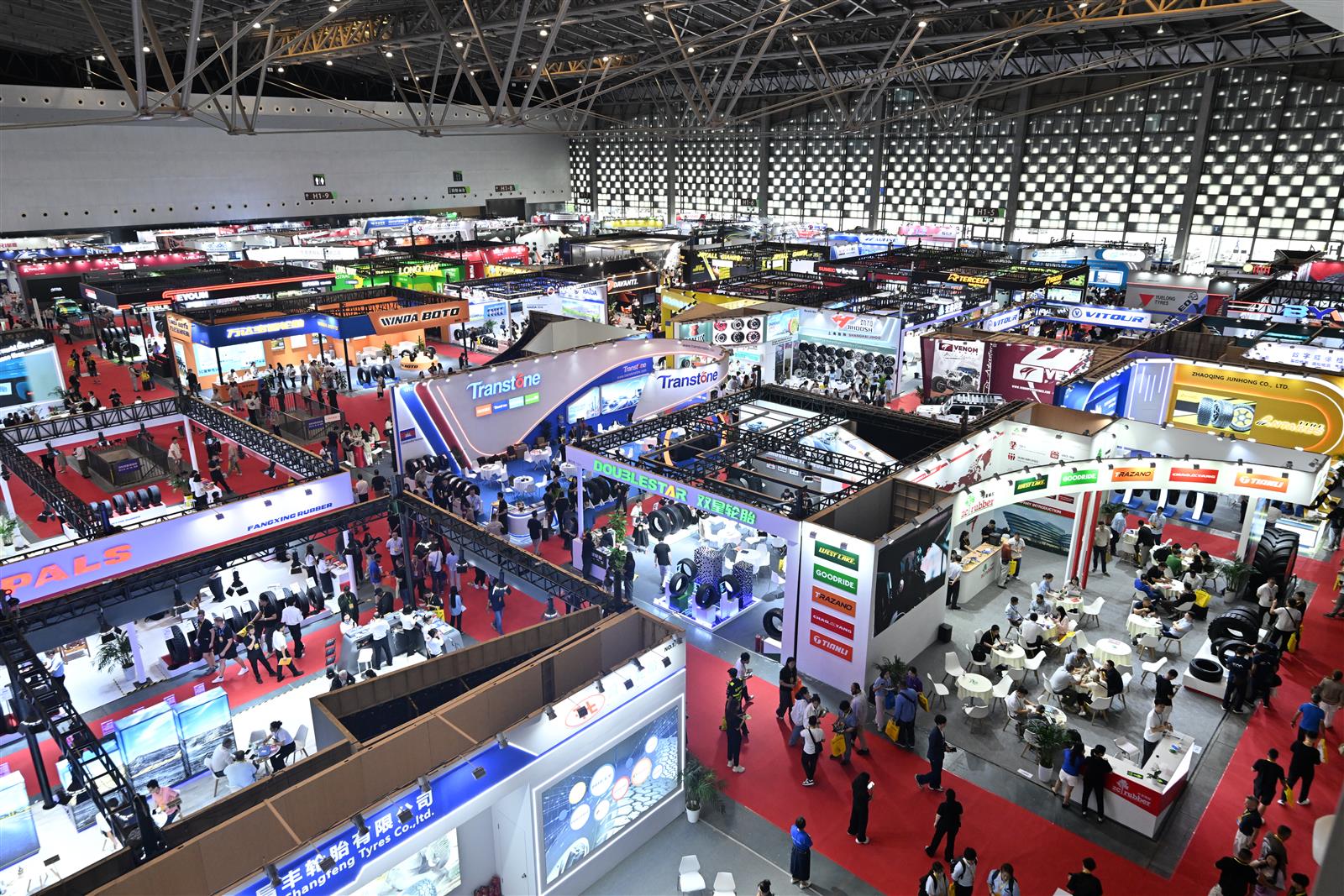 Exhibition hall of the 21st Shanghai Tire and Wheel Expo 2026 with tire and wheel exhibitors from around the world
