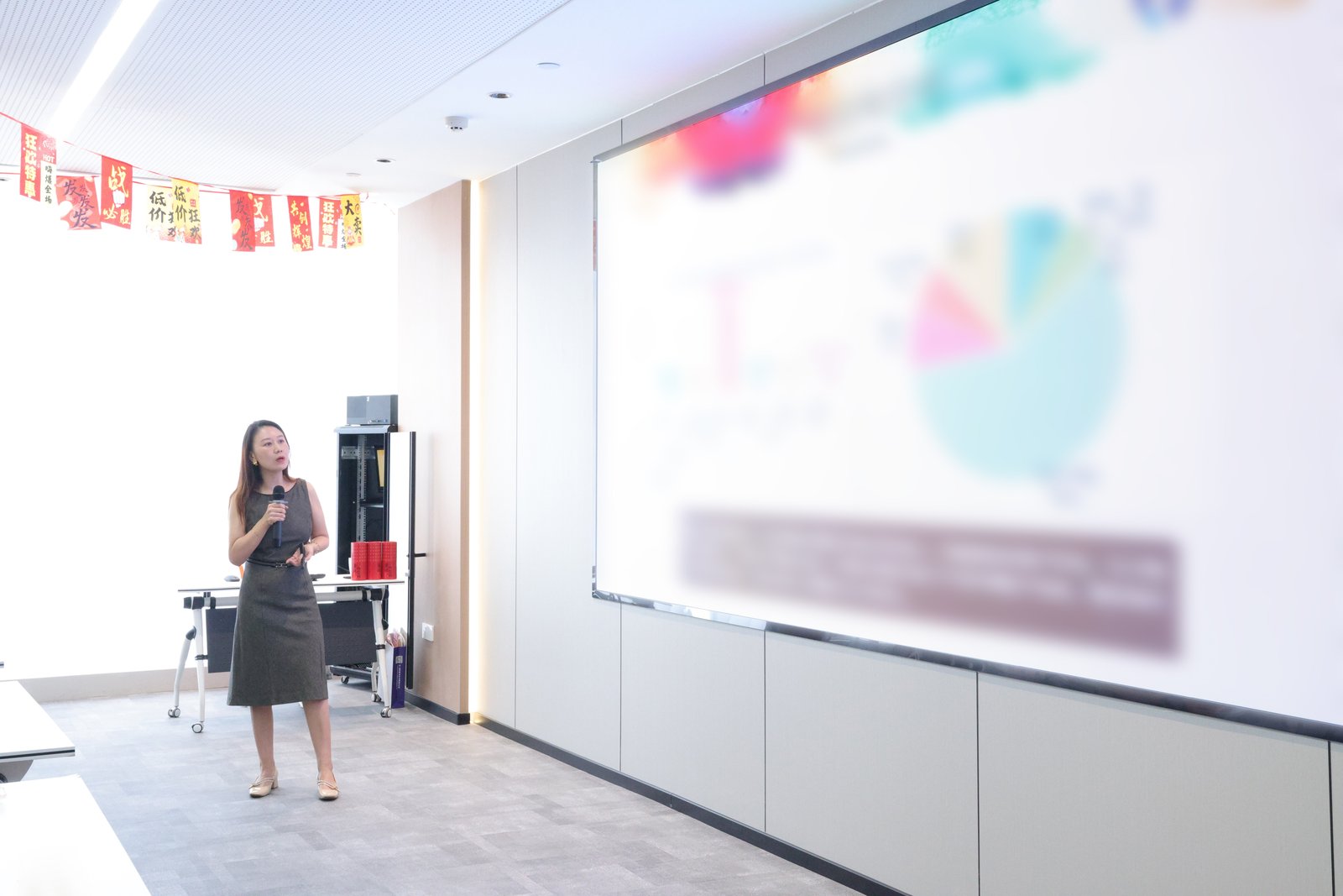 Team presentation session at the Florescence 2026 Q4 Kickoff Meeting in Qingdao, China